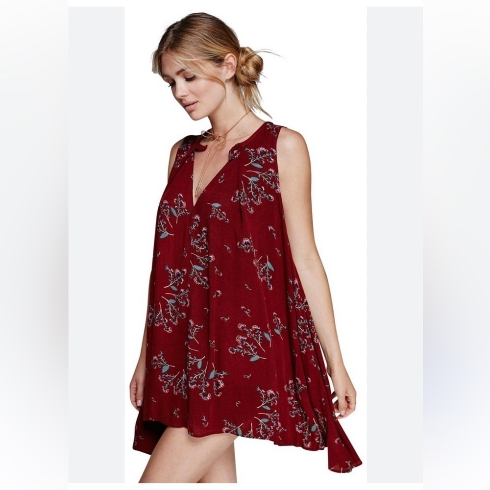 Free People Burgundy Floral Tunic Top with pocket. Size Xs